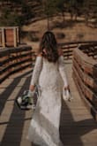 This dress fit perfect with a little stretch! Gorgeous little train too! So many compliments. - Megan C.
