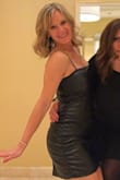 This dress fits like a glove but has some stretch to the material so you can move easily. It is extremely flattering with the ruching on the sides. It is definitely a head turner. It keeps it's shape well and I received a lot of compliments. - Holly R.