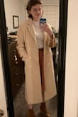 This might be the most beautiful piece of clothing I own. It's a great length that covers most of your legs if you're someone who wears skirts in winter, it's decently warm without being too hot, and it's great quality! I got the small, and there's still room in the arms and shoulders if I wanted to wear a bulkier sweater or even a jacket underneath. It does look a little bulky for my frame when I button it up, though, so I might have sized down if I wanted a perfectly tailored look. - Madison J.