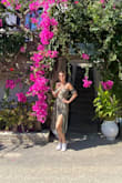 I love this dress. It's very comfortable. The slits are pretty high but I wear shorts underneath and it's totally doable. Can dress up or down! :) - Michelle L.