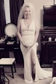 I ordered the dress for my wedding, and I was kinda nervous about ordering it because of the price but it was so worth it. This dress is amazing and the pic on the website don't do it Justice to the detail in the lace and the back of the dress drags the floor so beautifully. - Angela W.