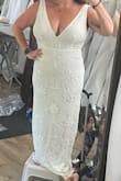 Who can say they spent so little for a high quality wedding dress - online no less, I can!!! I was blown away by the quality of this fully beaded dress.  I am five feet tall so naturally I had to have it hemmed, but other than that it fit like a glove in a medium! Every time anyone asks where I get my clothes 99% of the time I say Lulus, and now I add I even got my wedding dress there! - Jordyne C.