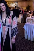 I wore this to my cousin's wedding in upstate NY in June. I got as many compliments as the bride! It is just beautiful. The color, the fit, all of it!! It gives off that sexy vibe with its plunging neckline. If you're on the fence, go for it! You won't regret it!! - Danielle C.