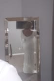 I have mixed feelings about this dress because I'm having a beach ceremony. The dress was heavy like a blanket and the shoulders keep sliding down so would need to be altered and it was long as well. I loved the back of the dress very elegant. I was surprised because I have a pouch belly and flat buttocks but this dress made my stomach look flat and butt looked nice as well. If I dont find another dress I'm going to order in a L and add a blingy belt to this one - Shaniqua P.