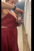 Color was beautiful, a little more purple tones than the picture, the bust fit but just showed too much of my breasts (I'm actually a 34 g), and right under the breast, it stuck out a little funny. I then tightened the straps and they dug in too much. But the draping was beautiful and this dress could have worked with some fixes. - Blaire W.