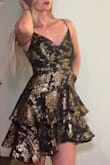 Perfect dress for a New Year's Eve party! The material does not stretch and is true to size. It's very comfortable and fits perfectly. - Brittany O.