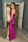 This dress is beautiful and fit perfectly on my daughter. Even though she's on the shorter side, with heels it was the perfect length. The shimmer and pattern in the fabric is so pretty, and it's very comfy! - Elizabeth G.
