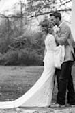 If you are thinking about getting this dress- this is your sign to get it. I searched high and low for a bell sleeve wedding dress. The only other style I found that I liked was a $4,500 dress. This has the quality of a designer dress. I ordered a size medium, and it fit me like a GLOVE. I did get the waist taken in about 0.5" on each side, and tacked the lining to the lace. I didn't wear a bra or shapewear whatsoever. When I told the girls where I got my dress and how much I paid for it, their jaws DROPPED. I got so many compliments! Side note: you can also wash this dress. I had gotten red mud on it during the reception. Took a risk the day after the wedding and washed it on the "hand wash" setting in my washing machine and hung it to dry- held up great! - LEIGH A.