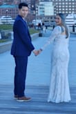 It runs true to size, it's a bit stretchy so it still leaves room and fits comfy. The fabric is delicate. I loved the dress so much that I didn't want to take it off! 
Totally recommended. - Ana M.