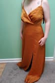 Size Small. Pretty fabric and color but thin material. The chest is way too big on me. Don't think the style would be flattering on me even if the fabric wasn't bunchy in the bust. There are no cups built into the dress. - Lainie T.