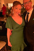Wore this to a formal winter wedding and got endless compliments! It fit me like a glove and required no alterations, no bra, and best of all--no SPANX! The satin material is the thicker kind that actually does you a favor--it conceals lumps and bumps, rather than thinner silk/satin that highlights every little thing. Be prepared to get the dress steamed or do it yourself as the material will show up wrinkly and those wrinkles are STUBBORN! - Jenny D.