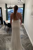 This dress is beautiful. It would be perfect for a beach wedding. It's comforting and lightweight. The color is perfect. - Mikelle W.