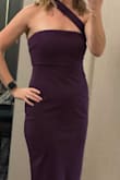 This dress fit me perfectly, I'm so glad I read the reviews about the fit and chose the medium because it was just right. Very sophisticated look while being quite simple. The only reason I didn't give it five stars was that, as others also said, the strap is way too long (had to tuck and pin it but it never really felt secure, so will need to get it altered). Also, the back zipper sticks really badly when it's traveling through the thicker part of the fabric. I was scared to death every time we tried to zip it up or down that it would rip but we managed ok. The dress is so fabulous it's worth the alterations though, so I'll do that for sure! - Caity R.