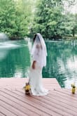 This was my wedding dress and it was everything I wanted and more for our backyard wedding. I couldn't bare the idea of spending a small fortune on my wedding dress. Quality is comparable to a good quality prom dress, definitely not high-end but still amazing for the price. The lace bottom does pull and catch dirt easily so be careful when outside. I'm short so I did have the front hemmed and left the train long.  Stop looking and buy it you won't be disappointed - Lindsay W.
