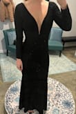I wore this for a NYE black tie wedding and got so many compliments! The sparkle is beautiful (though hard to capture in photos in the dark) and its overall very comfortable. I did have to hem the length (I always have to hem long dresses) as well as shorten the sleeves. Quality-wise it is a thinner, cheaper feeling material but I think the low price reflects that. I hope I get to wear it again! - Lauren A.