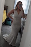 I LOVE this dress! The lace is beautiful and the fit is great! I have trouble finding things that fit due to being small with a bigger chest but this works well! With ordering online, I'm always worried about quality but this feels like a really expensive wedding dress, although it was under $100! - Anna H.