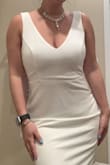 Love this dress especially the back! It's nice thick stretchy material. Fits true to size, wore 3 inch heels with it and didn't need it shortened. I've seen bridal shops charging 3k for a dress like this! - Erica M.