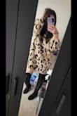 I love the way this dress feels! It is so cozy and adorable. Runs big, but it's not a huge deal to me. Just depends on how long you'd like it to be on you! Also paired it with a black lip for a date night with my hubby and got so many compliments! - Amber H.