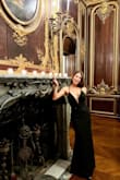 This gown is absolutely a showstopper! I received so many compliments throughout the night. I'm between 5'3" and 5'4" so even with a 3 inch heel I needed to hem about 2 inches off but beyond that I loved the fit. Classy and sexy! - Nicole V.