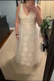 This dress fit my shape much better than any of the other mermaid styles.  The large was a little snug in the chest,  especially across where the belt is, which is a common issue in dresses for me.  I ended up ordering in XL and will have to get probably just straps taken up to make the top fit.  I love the shape of it (thicker straps, not too much cleavage) and that I can wear a regular bra.  I'll probably have to hem the skirts.  The inner lining is definitely tan which isn't as obvious from further away.  It would be perfect to me if it was white.  I may try and have it relined in white.  Keeping it as an option for my wedding in July.  The first photo is of the large and the second is the XL. - Caitlin K.
