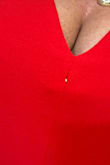 Really love this jumpsuit. I never wear red. Just need to have the seem fixed...I put it on and saw something silver poking out - looks like the boning maybe? Anyway, gorgeous. - Traci S.