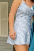 it fit so well and had so much more shape than the picture showed. in the waist it was tight enough to give me shape and the top was so nice. it also was the perfect length and such a nice silky material. - Ashleigh M.