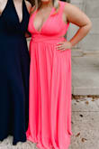This dress was very flattering! I have a shorter torso so I actually ended up just pulling the waist up more to hide the cutouts and it looked great! It was a little tight in the rib cage area but not unbearable, and it had no issue zipping! It's a bit long. You'll definitely need boob tape if you have a larger bust, but it's a beautiful dress and beautiful color, I got lots of compliments! - Madison H.