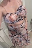 If you want your special occasion dress to come with a side of tasteful under-boob, then look no further, this is the one for you. The top features an interesting design choice that isn't visible online. Pics for reference. - Erica R.