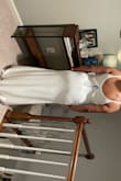 This one is elegant! Great stretch to the material and would definitely travel well. The back was odd on me so it would need to be altered. The opening would work on a different body type than mine for sure! Ultimately returned because I did not have time for alterations. - Liz C.