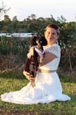 My fiancée and I eloped on New Year's Eve at the park. This dress is absolutely beautiful. It fits perfectly. - Gloria M.