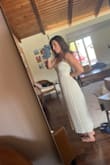 I really wanted to love this because the material is so beautiful but I have a vastly different waist-to-hip ratio, and the waist sits a little high. It's more like babydoll. That makes me look like I have a stomach and it just shortens everything. I tried getting it hemmed since I'm 5'2 but it didn't help. Oh well. Side view (pre-hem) was flattering when I leaned back - otherwise, it would billow out - Sofia S.