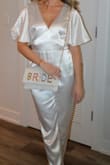 Wore this to our disco-themed engagement party and it was a total hit, got so many compliments (as usual when I order from Lulus). Ordered a small and it fit perfectly, was difficult to bend over at all though as there's not a ton of give in the material. It also wasn't see-through to my surprise, which was a huge plus. Loved the sleeves. - Hanya S.