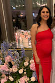 I'm 6 months pregnant and needed a formal dress for a wedding and this dress delivered! I'm normally an XS but sized up to a small and it fit perfectly the only thing it was a little to long but can be fixed with some high heals or taken in to get altered. Over all i was comfortable all night and my baby bump looked so cute. - Maricruz Q.