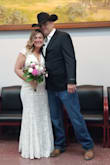 I was originally looking for a casual maxi dress for our courthouse wedding. I chose to go white and am so happy I did! Our wedding was in February. I wanted something practical, but that I could feel beautiful in at the same time. I work my favorite cowgirl boots and wool jacket. I also added a waistband the dress doesn't need it, but it added a little something. I didn't want to overdue to the look with too much jewelry. I chose pearl dangle earrings. Once the dress came & I tried it on... I didn't want to take it off. The material is quality. I felt so beautiful on my special day & am overly pleased with my dress. Dress is a large. - Darsha N.