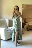 I love the color, the cloth and the model, It was too big in the bust area and under the bust area so I ordered a S size and fit me almost perfect - Sol C.