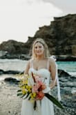 I ordered 2 bows and 2 headbands for our elopement in Hawaii! I couldn't decide until I put this headband on. It's so pretty without being too much. It ties at the bottom and stayed in place. The only downside was that the cove we were in was  SO windy and my hair did get tangled in the wires/pearls but it still looked just as beautiful! - Maddie G.