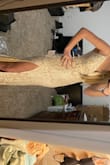 Beautiful dress. Once I get a bra for it, it will be perfect. Can't wait to wear it for my beach wedding!! Wish the review would've let me post the entire photo and not just half of it. - Grace B.