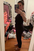 I am typically not a jumpsuit girl because they don't hide my stomach like I want them too, but this one is perfect!! I wore it on a 5 hour plan ride and it was insanely comfy, breathable, and stylish. The fabric is soft, cotton material, and you can adjust the straps by tying the knots different lengths. I am 5'2" and the length was perfect on me, so this may be a little short on the tall girlies. I feel this would be perfect for a casual night out or dress it up for a summer party. You could even wear it as a bathing suit cover-up. 10/10 in my book! - Kelsey M.