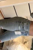 Model is listed to be taller than me by a couple inches. In the picture, the jeans appear way more high waisted, and they actual fit the entire length of her leg, they end just around her ankle. On me, they are just a couple inches too short which makes no sense because I'm shorter than her. I think the photos are edited and it just doesn't appear the same lengths. I ordered a size 5. Jeans were super comfy and fit perfectly otherwise, would order again if they provided longer lengths. - Natalie T.