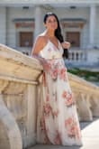 I got this to wear for a castle photo shoot in Budapest and couldn't have been happier. It is a little small in the chest at least for me and too long even with heels but has such a good flow. I got so many compliments.   I'm usually a size 0-2/xs-s and I'm 5'5" and got the small. - Lindsay W.
