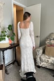 It fit me perfectly and it was the most comfortable dress I tried on. I love the puffed sleeves (length was perfect), the neck line, and the slit. I like how the slip is nude rather than white. I wanted something a little more fancy so I didn't keep it, but this was a close call for my wedding dress. - Carlie W.