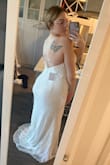 I sized up on this based on the size chart and went with an xl and it was way too big in the top. Overall gorgeous dress. The train tends to bunch up and not flow very well. - Jasmine H.
