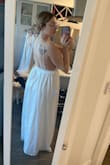 Gorgeous dress. Super bright cool white, warmer whites tend to flatter me a little better. Considering saving for a reception dress. Would be great a beach wedding - Jasmine H.