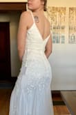 BEAUTIFUL dress. I have had trouble finding a dress that was flattering for my body type (flat chested, broad shoulders, smaller waist) but this dress was perfect. Although I ended up going with a different dress, it was a very difficult decision. - Franny B.