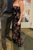 I loved this dress so much. The material and pattern are stunning and I received so many compliments. However, the material is not strong and it seems like the stitching comes undone easily. I had a large hole in the back before we even left for the wedding we were attending. Luckily the dark lining underneath made it difficult to tell. When we made it to the wedding, the side of the dress opened as well. The dress was not snug, and it should not have ripped. The zipper was very difficult to zip as well, even when it wasn't being worn. - GEna M.