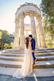 I'm really happy with the dress. Purchased it for the pre-wedding photoshoot. The lace and the long tail are awesome. I look like a princess in it. - Viet N.