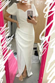 The dress material is so good and the dress is so flattering I'm in love!! I got a small size. My top half from my waist up is a bit big for me esp my bust area, but my stomach area and my hip area fit só perfectly!! Buy it and you won't regret it. I can't wait to wear it for my engagement pictures. - Chloe D.