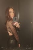 This top fits perfectly. Sexy, classy, and elegant. Perfect amount of stretch. Loves the color. Paired with black leather pants. - Rebecca G.