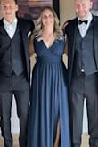 I loved this dress!! I needed to hem and pull up the shoulders a bit as it was a bit low cut for me. Perfect for my son's wedding. I felt amazing in this dress. The material is heavy with lots of layers so none of your lumps and bumps show!! - Lisa G.