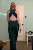 This is one of the most comfortable jumpsuits. And I absolutely love the deep plunge in the front. I love it so much I've worn it twice in less than a week! The bust is a little loose on me however sizing down seems it might be too tight around my hips and thighs. The color is stunning. I plan to order one in a different color. - Robin F.